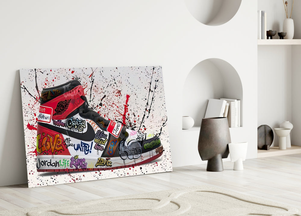 Close-up detail of scarlet swoosh and spray-paint slogans