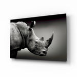 Rhino glass wall art displayed above a console in a designer interior