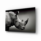 Rhino glass wall art displayed above a console in a designer interior