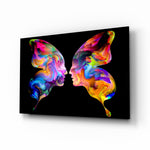 Butterfly Silhouettes glass wall art displayed above a console in a designer interior