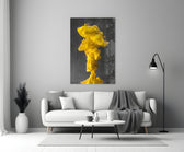 Close-up detail of yellow mushroom-cloud against charcoal tank