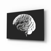 Brain glass wall art displayed above a console in a designer interior