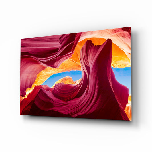 Red Valley glass wall art displayed above a console in a designer interior