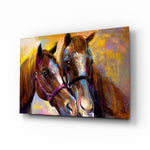 Horses glass wall art displayed above a console in a designer interior