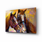 Horses glass wall art displayed above a console in a designer interior