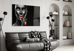 The Power of Orange glass wall art styled above a vanity in a powder room