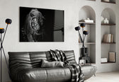 Tiger glass wall art styled above a desk in an introspective study
