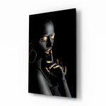 Silent Woman glass wall art displayed above a console in a designer interior