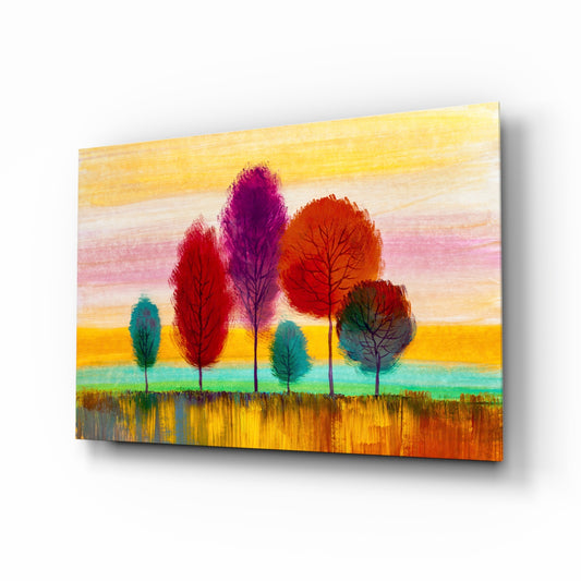 Colorful Trees glass wall art displayed above a console in a designer interior