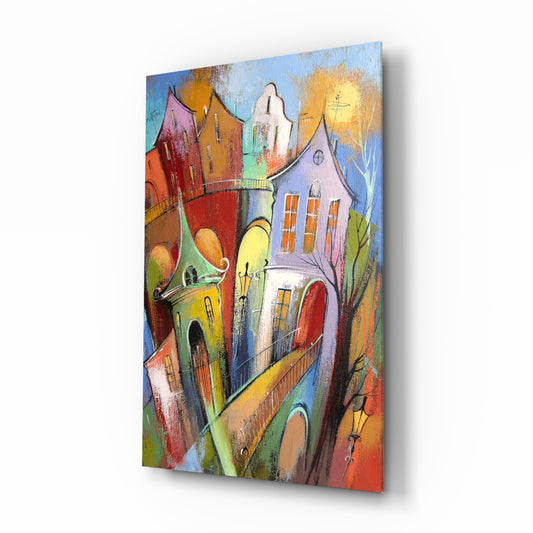 Colorful Houses glass wall art displayed above a console in a designer interior