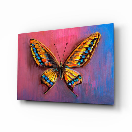 Butterfly glass wall art displayed above a console in a designer interior
