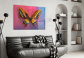 Butterfly glass wall art styled above a desk in a girl's room