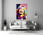Close-up detail of fuchsia and cobalt polygons forming Marilyn's smile