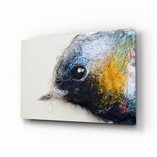 Tiny Bird glass wall art displayed above a console in a designer interior