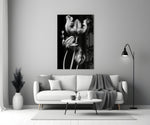 Close-up detail of ruffled silver tulip petals on velvet black