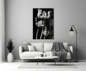 Close-up detail of ruffled silver tulip petals on velvet black