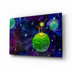 The Little Prince glass wall art displayed above a console in a designer interior