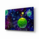 The Little Prince glass wall art displayed above a console in a designer interior
