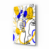 Abstract Faces glass wall art displayed above a console in a designer interior