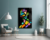 Colorful Spirit glass wall art styled above a desk in a creative office