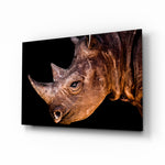 Rhino glass wall art displayed above a console in a designer interior