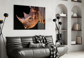 Rhino glass wall art styled above a desk in a study