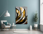 Gold Wave glass wall art styled above a sofa in a living room