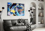 Eyes glass wall art styled above a desk in a creative office