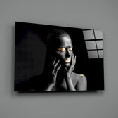Black-and-gold panel bringing luxe drama to a contemporary living space
