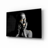 Gold Beauty glass wall art displayed above a console in a designer interior