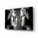 Three Muses glass wall art displayed above a console in a designer interior