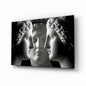 Three Muses glass wall art displayed above a console in a designer interior