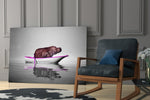 Pink Hippo glass print enhancing a creative office with editorial drama