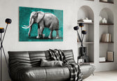 Teal Elephant glass wall art styled above a sofa in a living room