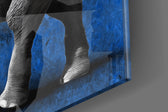 Cobalt Elephant artwork anchoring a wall with bold scholarly palette