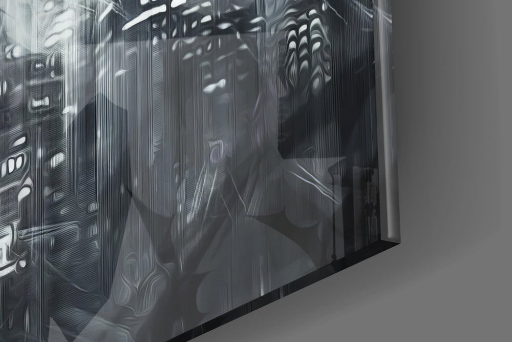 Batman Wings glass wall art catching light to reveal its painted moon