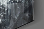 Batman Wings glass wall art catching light to reveal its painted moon