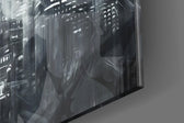 Batman Wings glass wall art catching light to reveal its painted moon