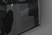 Batman Throne glass wall art catching light to reveal its painted waterfall