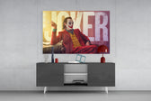 Joker Typography glass wall art catching light to reveal its painted letters