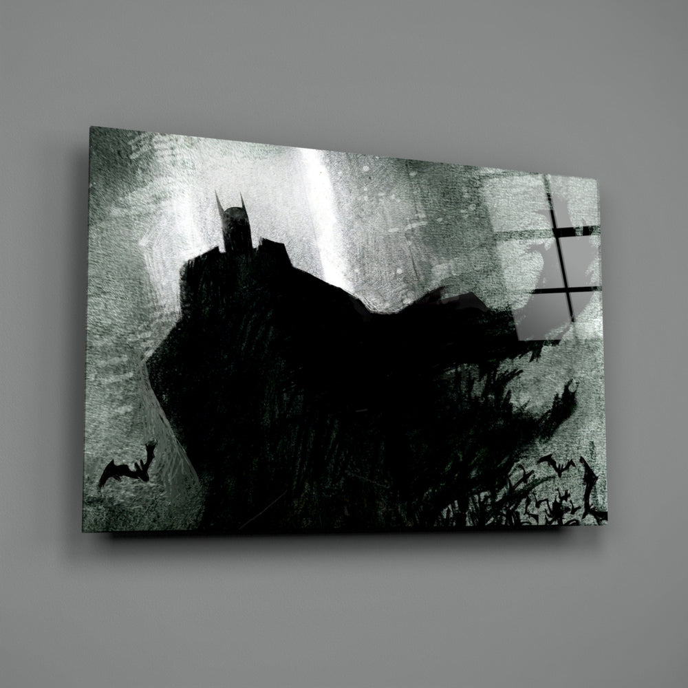 Close-up detail of charcoal Batman with cape-bats behind glass