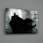Close-up detail of charcoal Batman with cape-bats behind glass