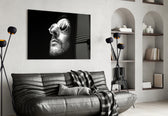 Cult-cinema glass print bringing 90s-thriller edge to a designer office