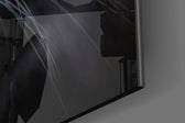 Anger of a Tiger Close-Up glass wall art catching light to reveal its painted whiskers