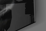 Joker Happy Face glass wall art catching light to reveal its painted hatching