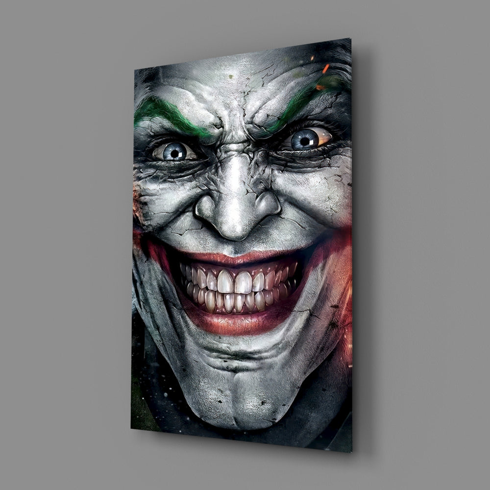 Close-up detail of comic Joker with cracked grin behind glass