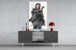 John Wick glass wall art catching light to reveal its painted ink