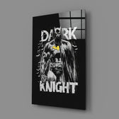 Close-up detail of comic Batman with canary symbol behind glass