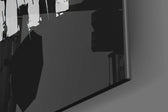 Dark Knight Comic glass wall art catching light to reveal its painted bats