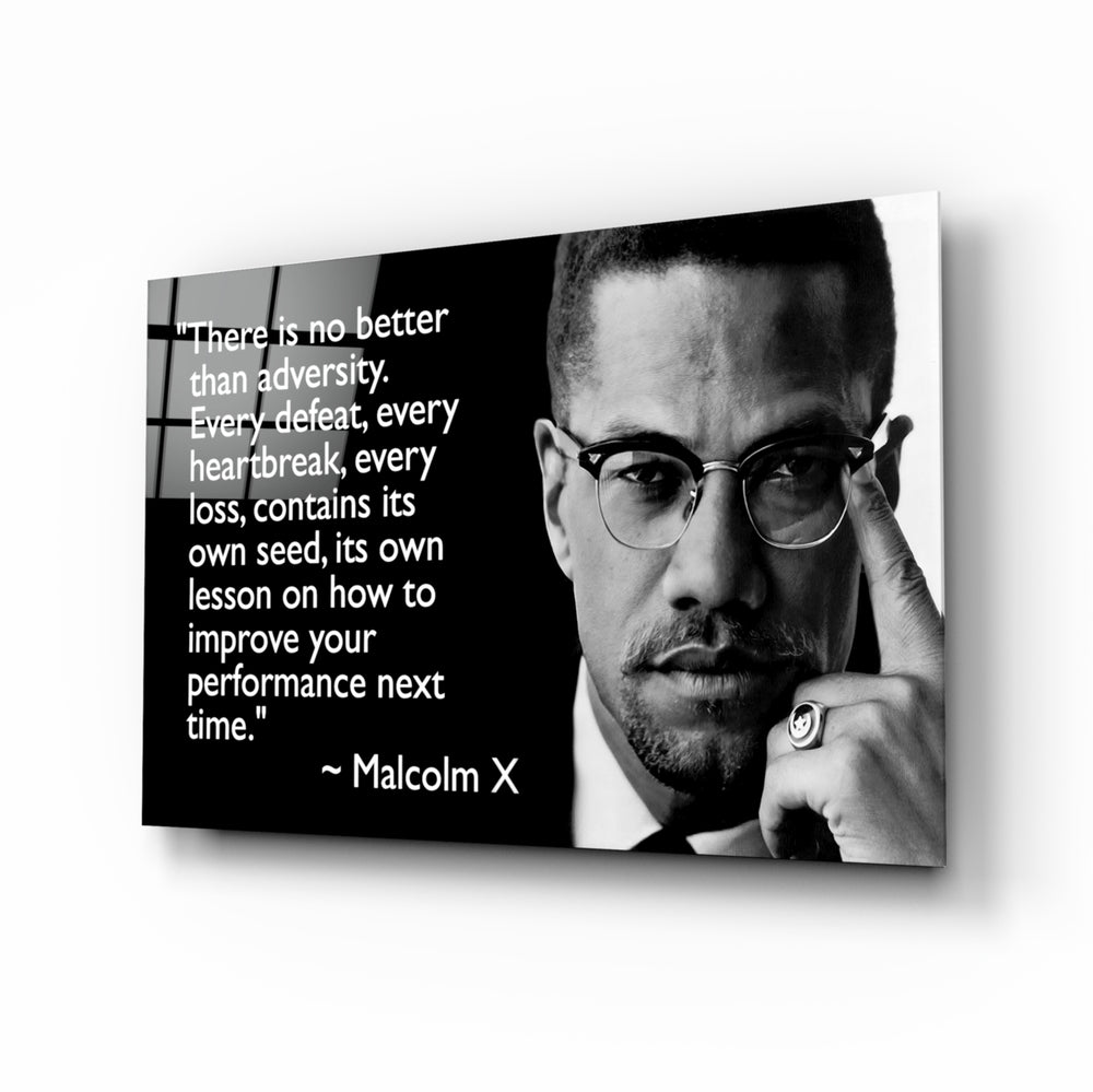 Words of Malcolm X glass wall art in a modern study